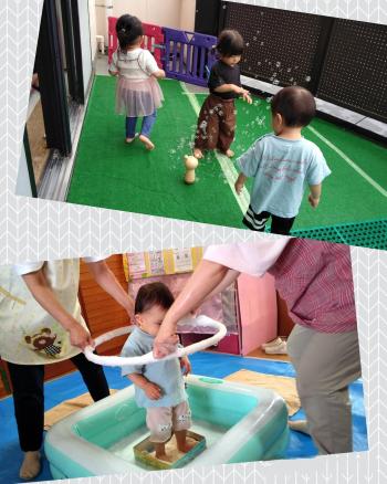 子どもたちがシャボン玉で遊ぶ写真