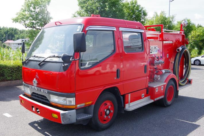 三菱キャンター消防ポンプ自動車（CD-1型平成7年式）の赤い車写真